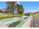 Community shuffleboard courts nestled in a grassy area at 12200 Vonn Rd # 1106, Largo, FL 33774