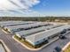 Aerial view of community showing building rooftops and parking at 12400 Park Blvd # 118, Seminole, FL 33772