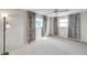 Spacious bedroom with two windows, ceiling fan, and ample closet space at 12400 Park Blvd # 118, Seminole, FL 33772