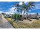Landscaped entrance to Seminole Hill Villas, a 55+ community at 12400 Park Blvd # 118, Seminole, FL 33772