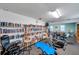 Fitness center with exercise equipment and library at 12400 Park Blvd # 118, Seminole, FL 33772