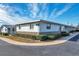 Exterior view of building showcasing light-colored siding at 12400 Park Blvd # 118, Seminole, FL 33772