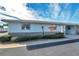 Front view of a single-story home with carport at 12400 Park Blvd # 118, Seminole, FL 33772