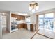 Kitchen with wood cabinets and appliances at 12400 Park Blvd # 118, Seminole, FL 33772
