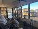 Bright sunroom with ample windows and seating at 12501 Ulmerton Rd # 140, Largo, FL 33774