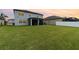 Large backyard with spacious grassy area at 13513 White Sapphire Rd, Riverview, FL 33579