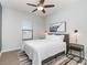 Guest bedroom with a comfortable bed and stylish decor at 13513 White Sapphire Rd, Riverview, FL 33579