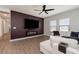 Gathering room with a modern fireplace and comfortable seating at 13513 White Sapphire Rd, Riverview, FL 33579