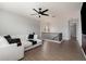 Spacious loft area with comfortable seating and wood-look flooring at 13513 White Sapphire Rd, Riverview, FL 33579