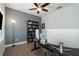 Home office with ample workspace and built-in shelving at 13513 White Sapphire Rd, Riverview, FL 33579