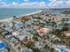 Aerial view showcasing a beachfront home location at 137 91St Ave, Treasure Island, FL 33706