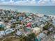 Aerial view showing a house's location near the ocean at 137 91St Ave, Treasure Island, FL 33706
