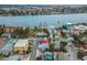 Aerial view of home by the bay, close to the water at 137 91St Ave, Treasure Island, FL 33706