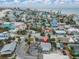 Aerial view of beach home and neighborhood at 137 91St Ave, Treasure Island, FL 33706