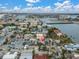 Aerial showing a house near the bay and bridge at 137 91St Ave, Treasure Island, FL 33706