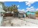 Backyard with detached garage and chain link fence at 137 91St Ave, Treasure Island, FL 33706