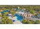 Aerial view of resort-style pool with water features at 14115 Indigo Ridge Ln, Lithia, FL 33547