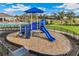 playground with a slide, climbing structure, and shade canopy at 16023 10Th E Ave, Bradenton, FL 34212
