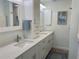 Elegant bathroom with double vanity and modern fixtures at 1643 Sea Breeze Dr, Tarpon Springs, FL 34689