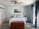 Bright bedroom with a comfortable bed and ocean view at 1643 Sea Breeze Dr, Tarpon Springs, FL 34689