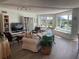 Bright living room with water views and comfortable seating at 1643 Sea Breeze Dr, Tarpon Springs, FL 34689