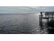 Tranquil waterfront view with a private dock at 1643 Sea Breeze Dr, Tarpon Springs, FL 34689