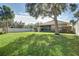 Spacious backyard with large tree at 17409 New Cross Cir, Lithia, FL 33547