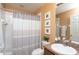 Small bathroom with shower/tub combo at 17409 New Cross Cir, Lithia, FL 33547