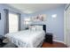 Bedroom with double bed and window at 17409 New Cross Cir, Lithia, FL 33547