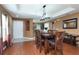 Dining room with a wooden table and six chairs at 17409 New Cross Cir, Lithia, FL 33547