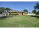 Single-Gathering house with a large front yard and driveway at 17409 New Cross Cir, Lithia, FL 33547