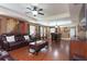 Bright living room featuring hardwood floors and open concept floorplan at 17409 New Cross Cir, Lithia, FL 33547