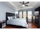 Spacious main bedroom with hardwood floors and ceiling fan at 17409 New Cross Cir, Lithia, FL 33547