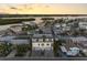 Aerial view of waterfront home with private dock and boat lift at 18077 3Rd St, Redington Shores, FL 33708
