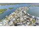 An aerial view of the property, highlighting the neighborhood and waterfront at 18077 3Rd St, Redington Shores, FL 33708