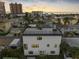 Elevated view of the home showcasing its unique design and waterfront location at 18077 3Rd St, Redington Shores, FL 33708