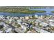 Elevated view showcasing a modern home near the water at 18077 3Rd St, Redington Shores, FL 33708