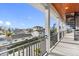 Private balcony offering city views and a spiral staircase at 18077 3Rd St, Redington Shores, FL 33708