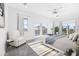 Main bedroom with access to balcony and modern decor at 18077 3Rd St, Redington Shores, FL 33708