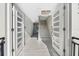 Bright and spacious entryway with modern staircase at 18077 3Rd St, Redington Shores, FL 33708