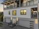 Modern home exterior with two-car garage and sleek architectural design at 18077 3Rd St, Redington Shores, FL 33708