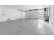 Clean and functional garage with automatic door and window at 18077 3Rd St, Redington Shores, FL 33708
