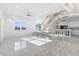 Bright and airy living room with hardwood floors and open floor plan at 18077 3Rd St, Redington Shores, FL 33708