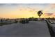 Relaxing rooftop deck with sunset views and palm trees at 18077 3Rd St, Redington Shores, FL 33708