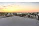 Spacious rooftop deck with sunset views and a city skyline vista at 18077 3Rd St, Redington Shores, FL 33708