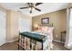 Charming bedroom with a full-size bed and ample closet space at 1819 Ravenridge St, Wesley Chapel, FL 33543