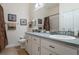 Bathroom with vanity, sink, and shower at 19387 Hidden Oaks Dr, Brooksville, FL 34604