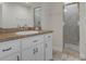Small bathroom with vanity and shower at 19387 Hidden Oaks Dr, Brooksville, FL 34604