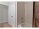 Clean bathroom with shower/tub combo and tile at 19387 Hidden Oaks Dr, Brooksville, FL 34604