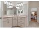Bathroom featuring corner sink and vanity at 19387 Hidden Oaks Dr, Brooksville, FL 34604